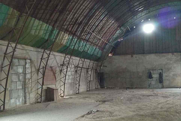 Капитальное строение общей площадью 1266,4 кв.м (наименование - цех деревообработки с АБК), расположенное по адресу: Гродненская область, Новогрудский район,  г. Новогрудок, ул. Советская, 85  